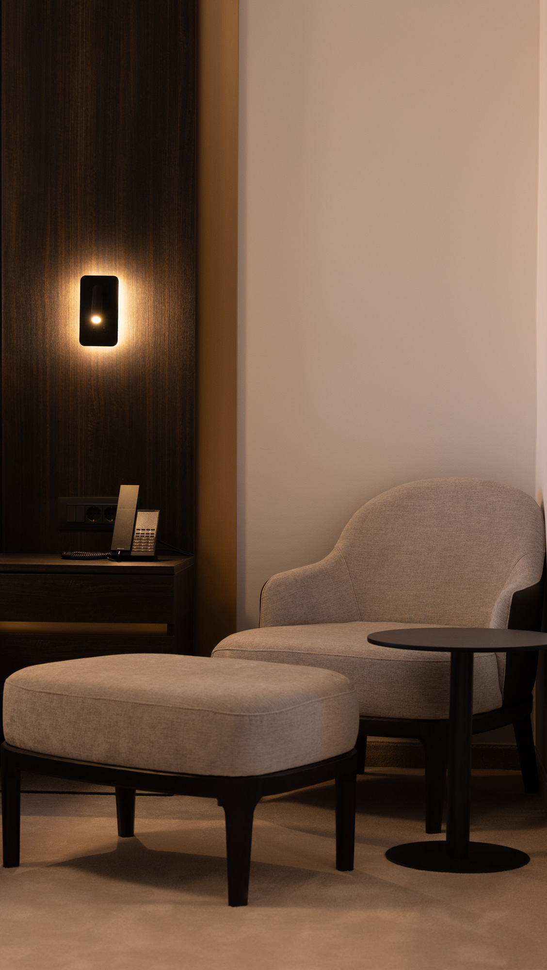 Armchair and reading sconce
