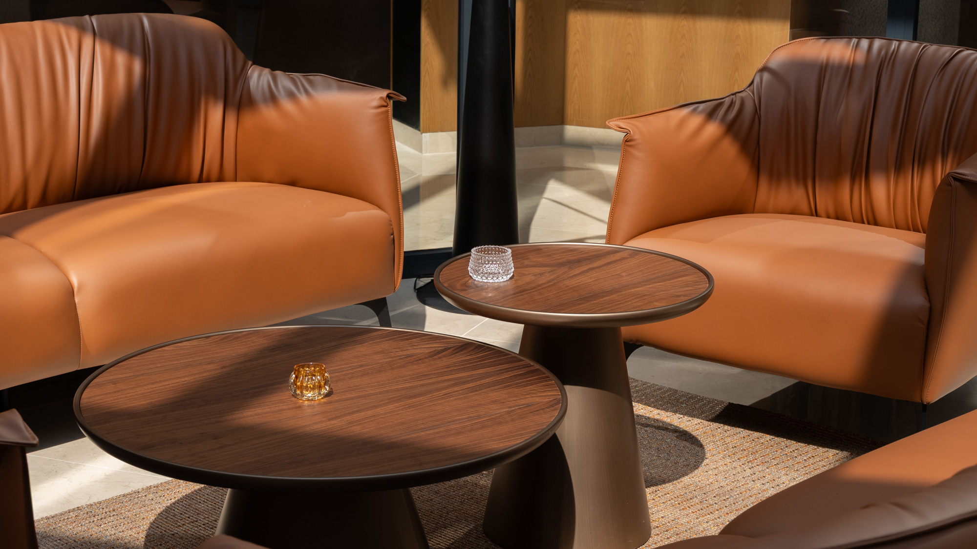 Cognac leather chairs and coffee tables