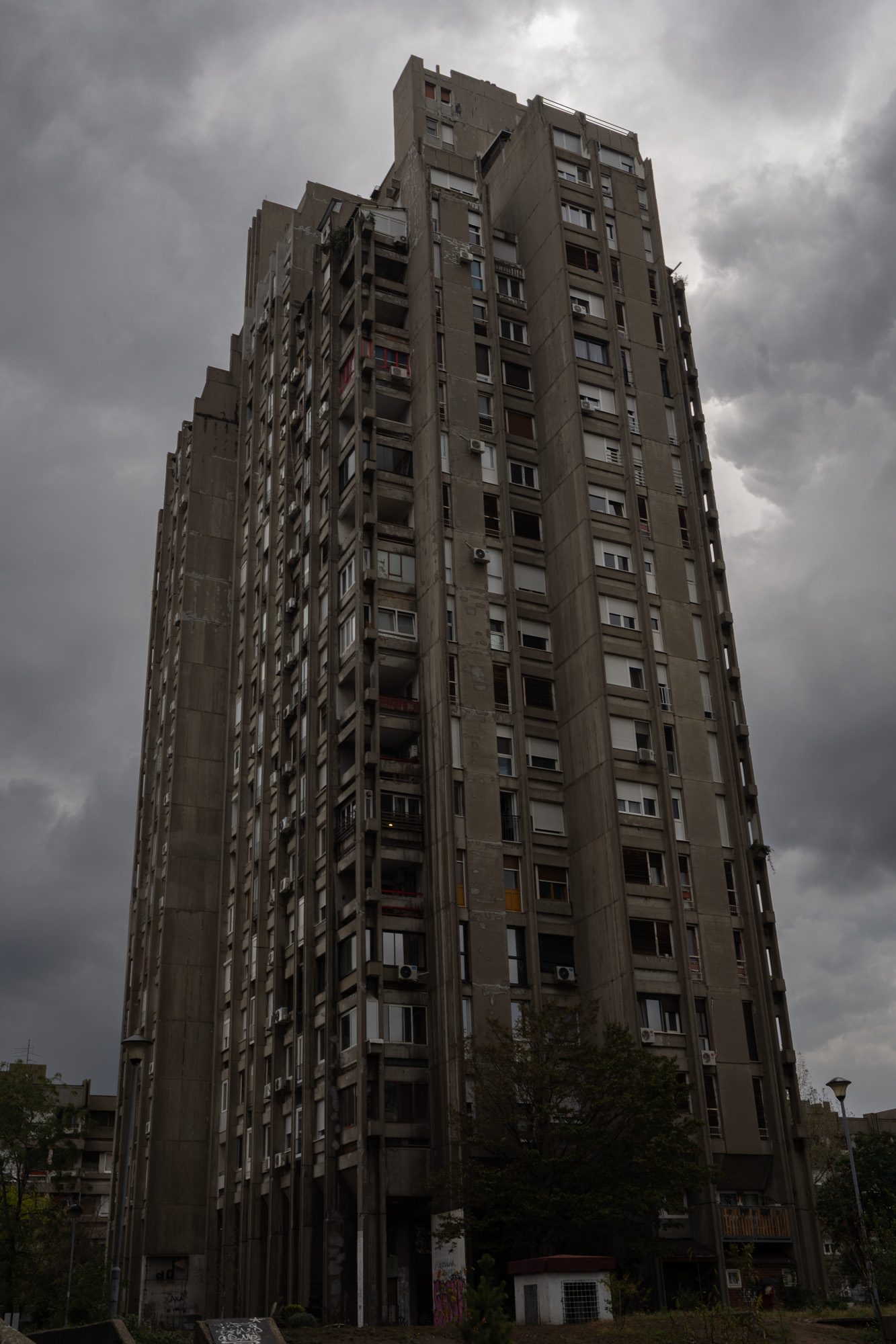 Zepter tower, Belgrade — full exterior under storm clouds