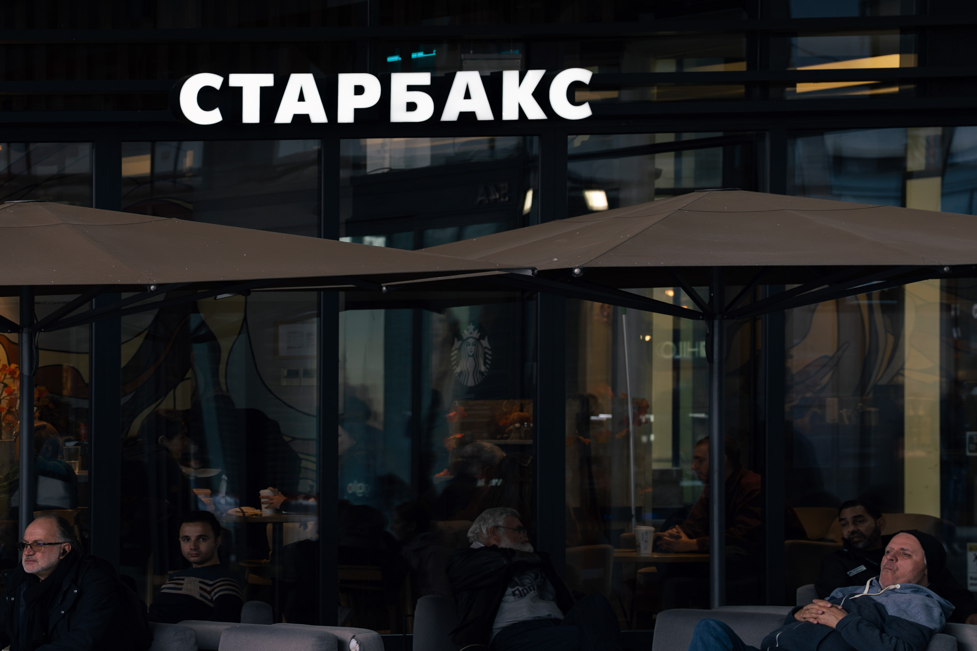 Starbucks in Cyrillic, Belgrade — people seated outside