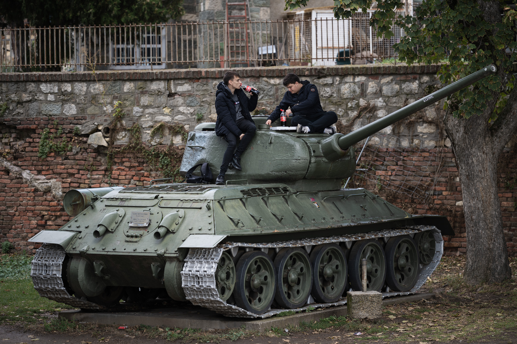 T-34 tank at Kalemegdan, Belgrade — two young men sitting on top