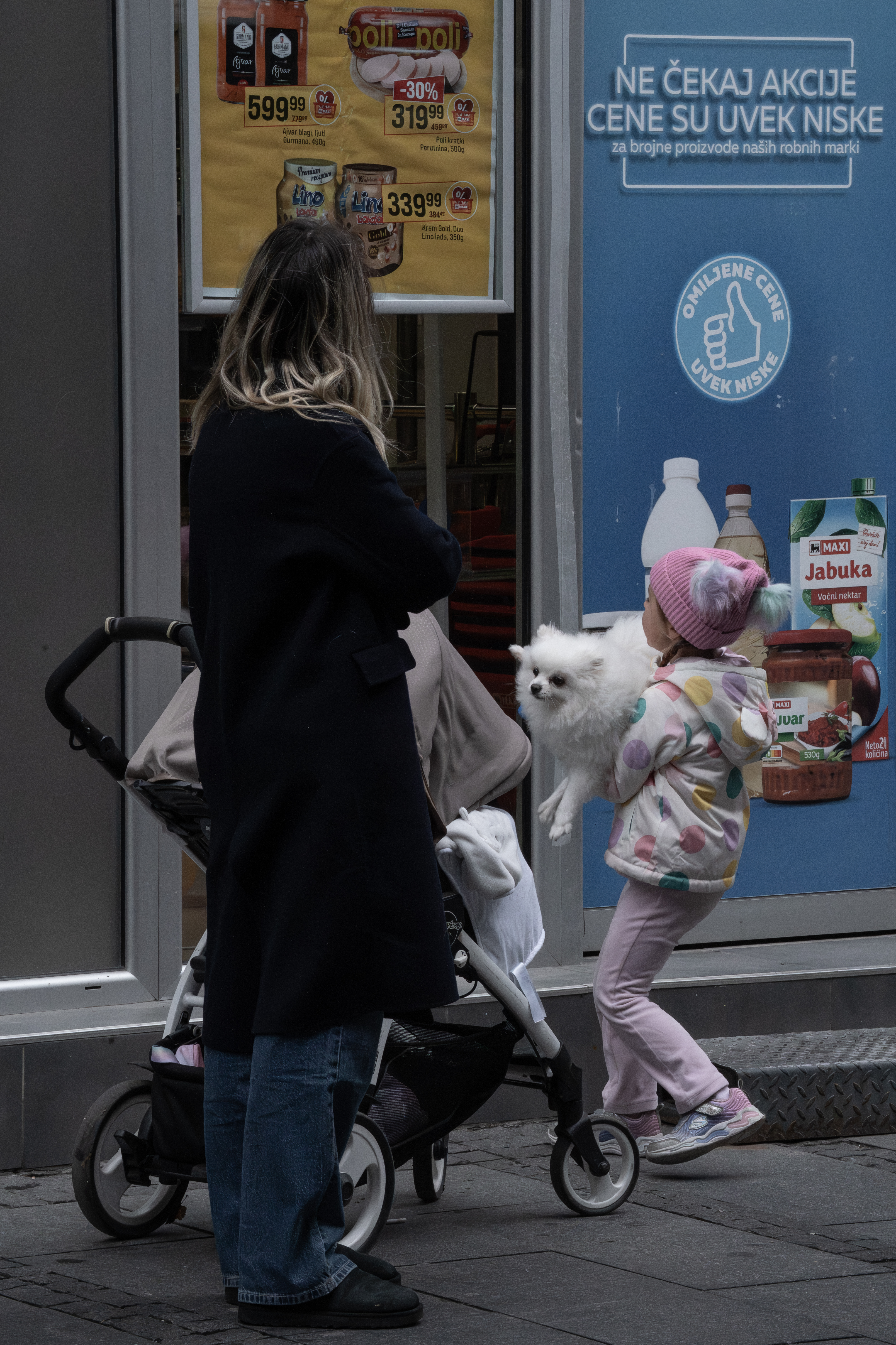 Morning commuters at a Belgrade bus stop